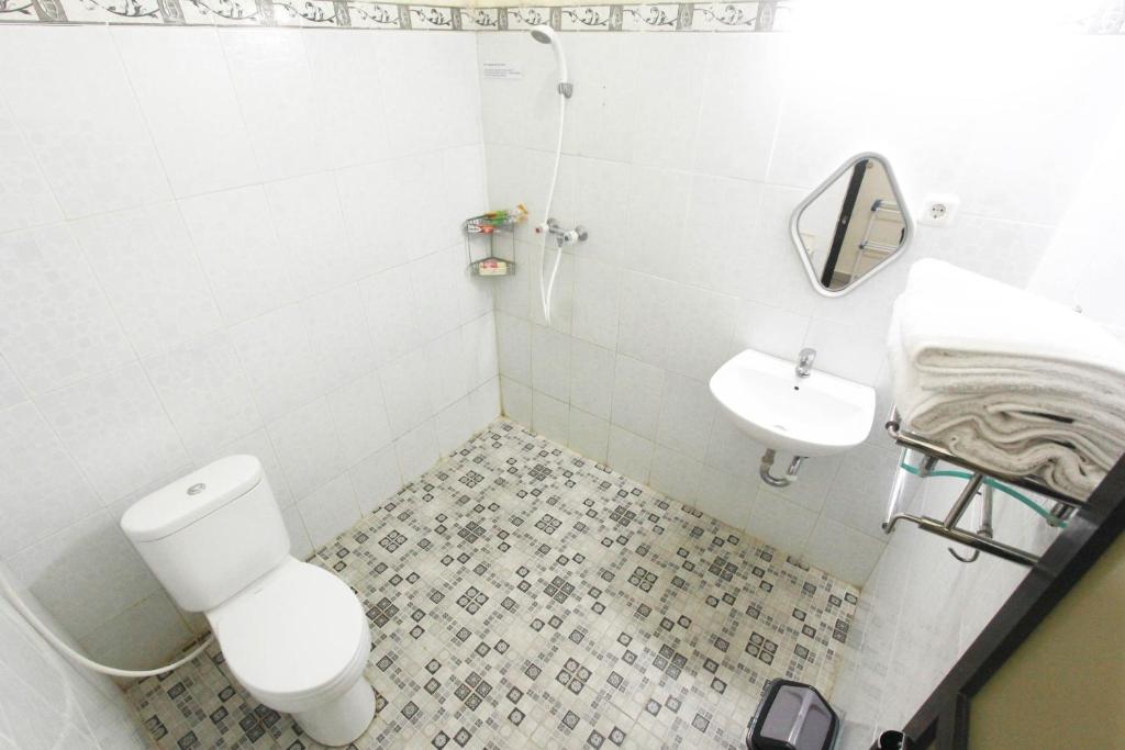 Koupelna v ubytování BeOne House Jogja