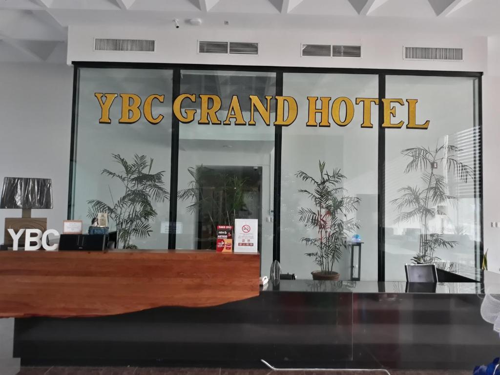 a yc grand hotel lobby with a large glass window at YBC Grand Hotel in Olongapo