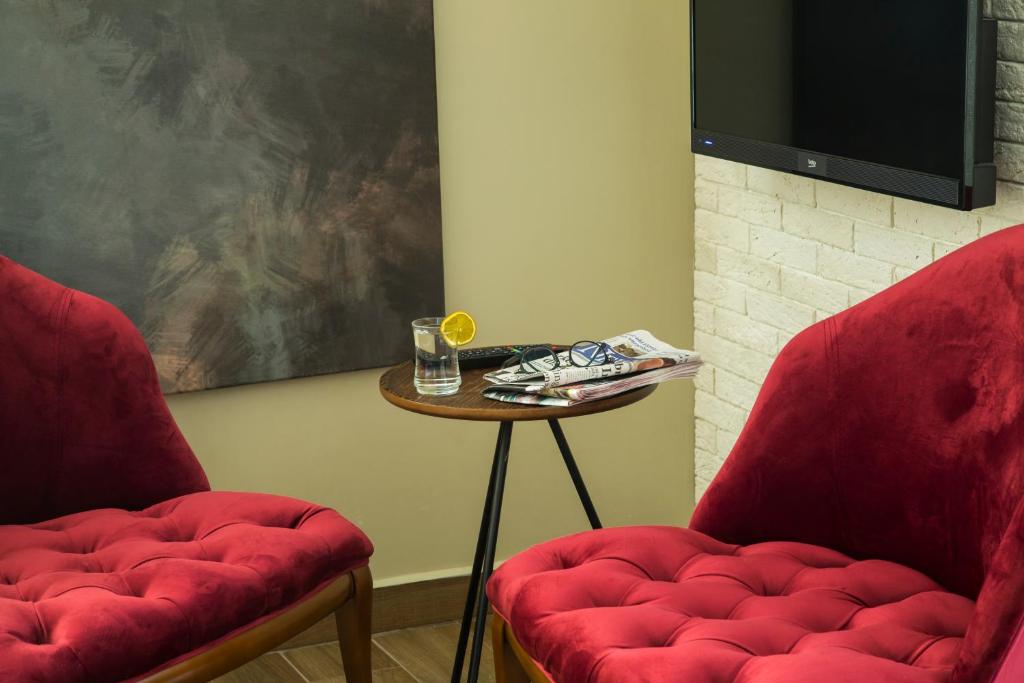 Posezení v ubytování Maxuite Hotel in Home