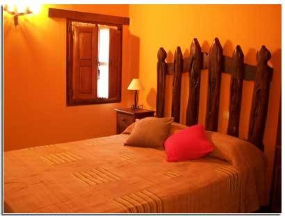Postel nebo postele na pokoji v ubytování Posada El Pescador