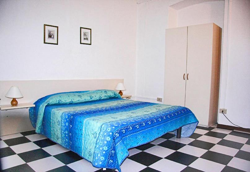 A bed or beds in a room at Pensione Rittmeyer