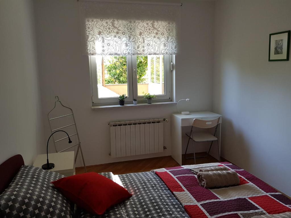 Posteľ alebo postele v izbe v ubytovaní Apartment 40