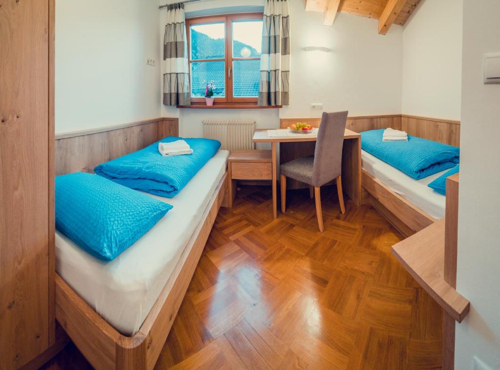 Łóżko lub łóżka w pokoju w obiekcie Appartements Else