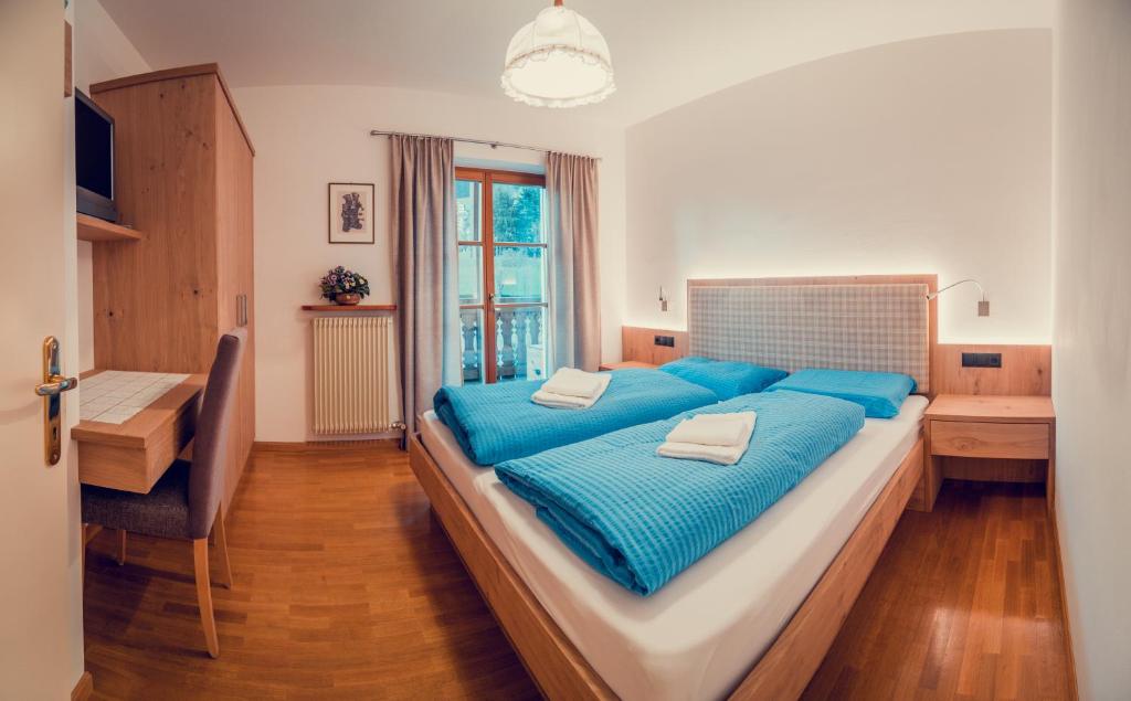 Łóżko lub łóżka w pokoju w obiekcie Appartements Else