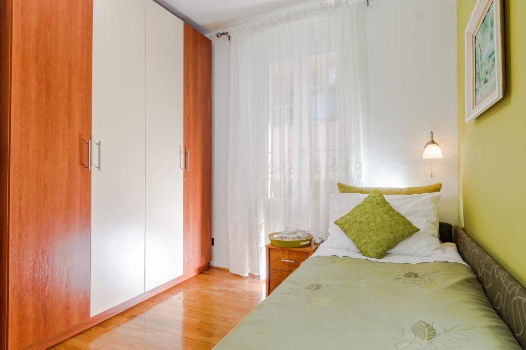 Posteľ alebo postele v izbe v ubytovaní Apartment Mama Luci
