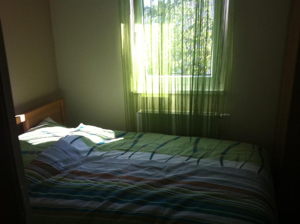 Postel nebo postele na pokoji v ubytování Hostel Plus Caffe