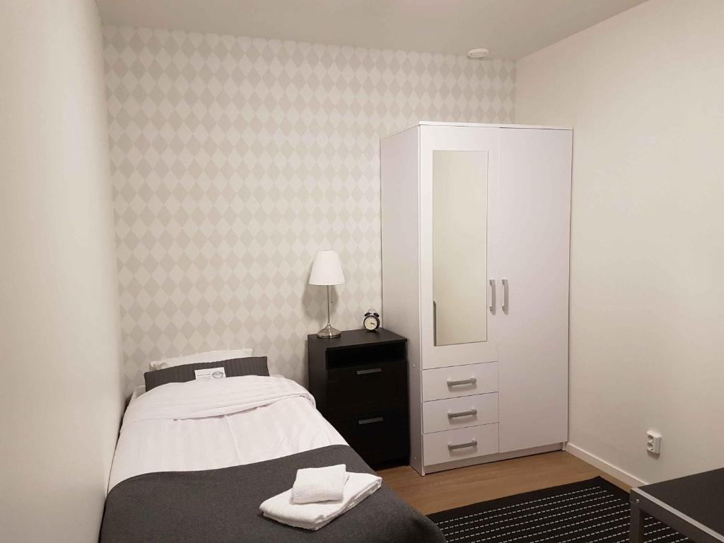 Postel nebo postele na pokoji v ubytování Spirans Rum och Logi