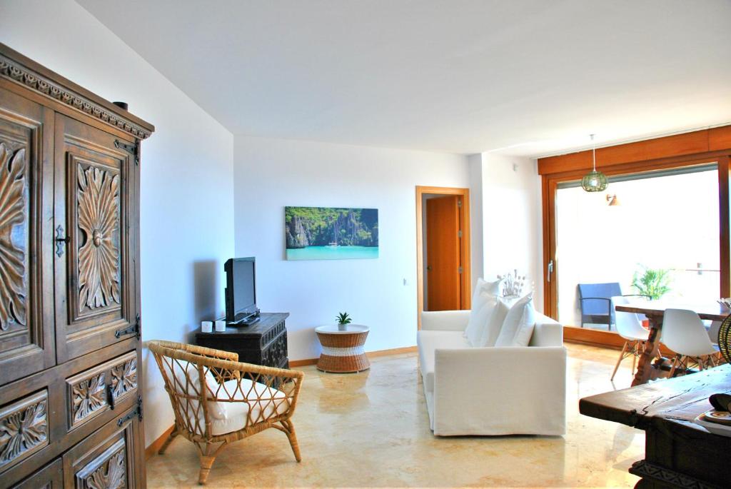 A seating area at Lomas de los Monteros - Apartment with seaviews