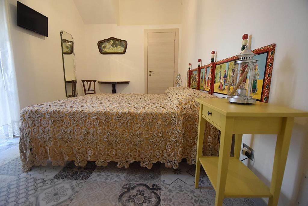 Posteľ alebo postele v izbe v ubytovaní Zù Mariu B&B