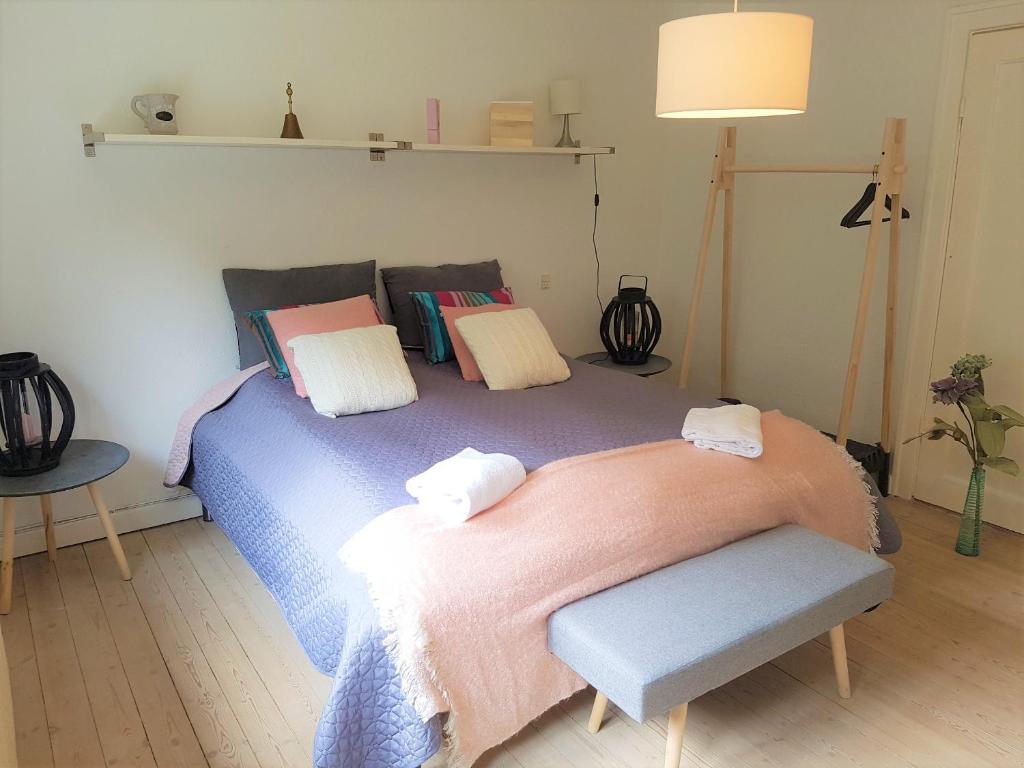 Postel nebo postele na pokoji v ubytování Koege Guesthouse