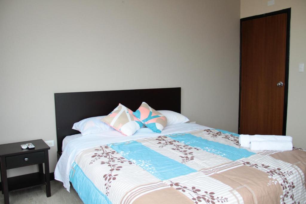 Postel nebo postele na pokoji v ubytování Fogata Hostel