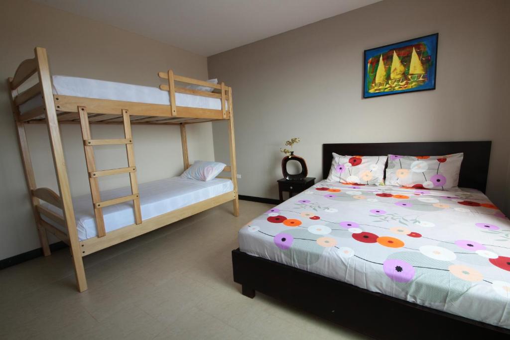 Postel nebo postele na pokoji v ubytování Fogata Hostel