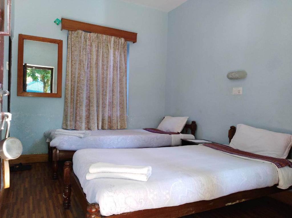 Letto o letti in una camera di Yeti Guest House