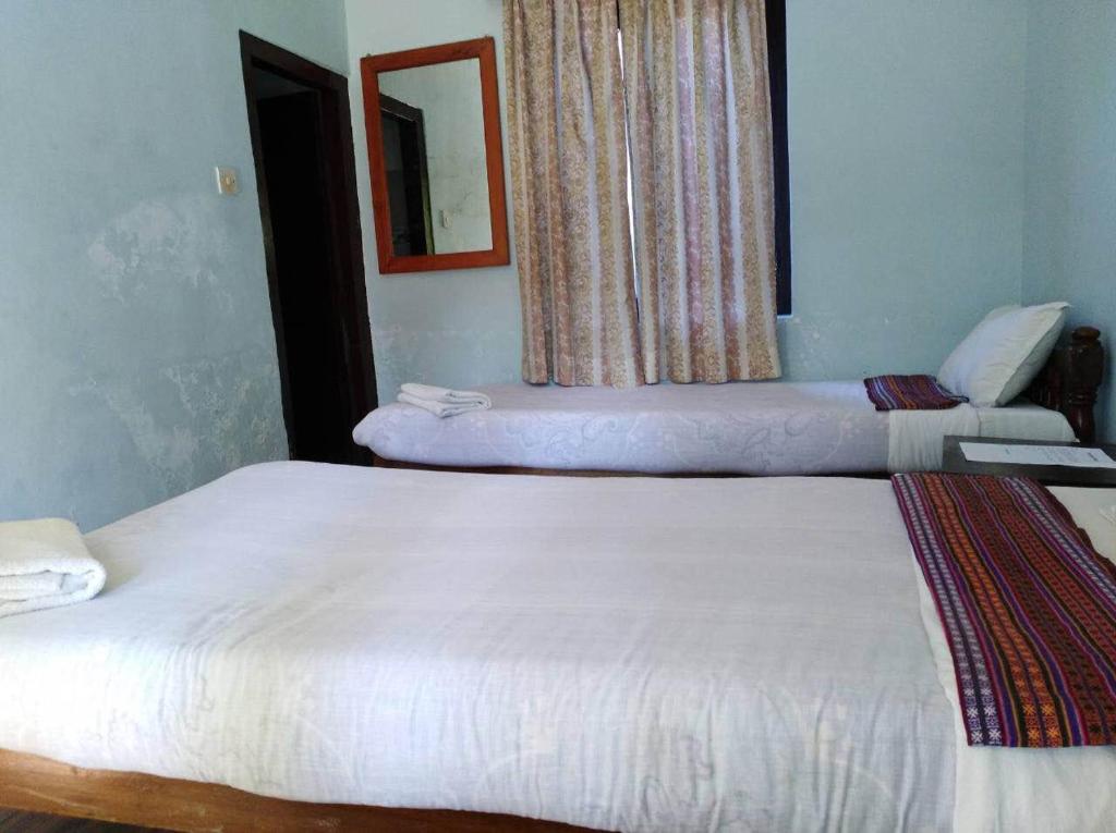 Letto o letti in una camera di Yeti Guest House