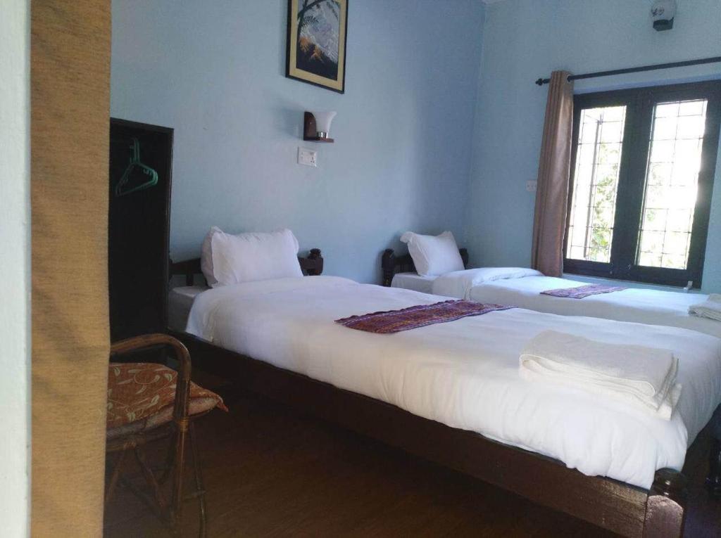 Letto o letti in una camera di Yeti Guest House