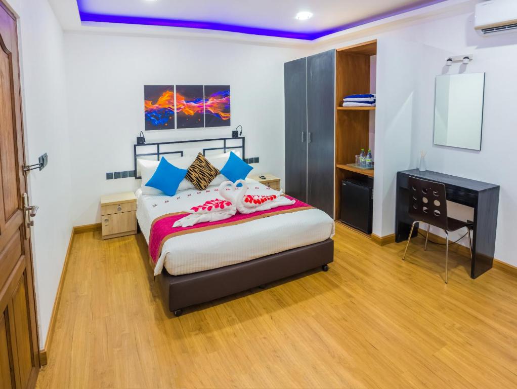 Postel nebo postele na pokoji v ubytování Asaa View Maldives