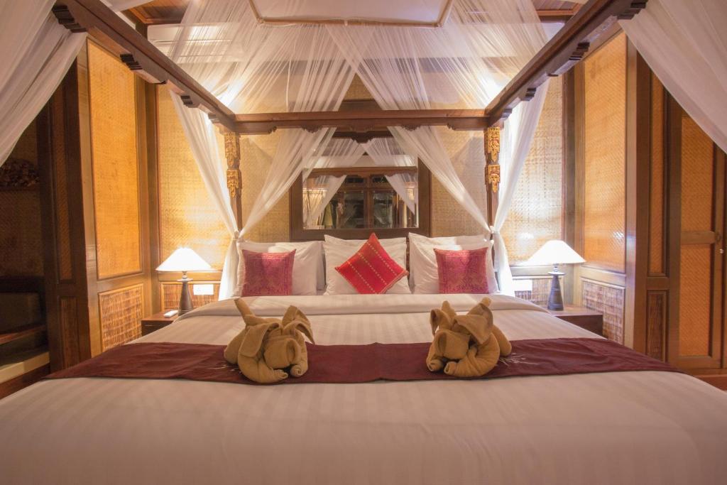 Postel nebo postele na pokoji v ubytování Ubud Terrace