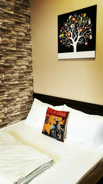 Postel nebo postele na pokoji v ubytování Juo House