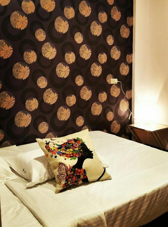 Postel nebo postele na pokoji v ubytování Juo House