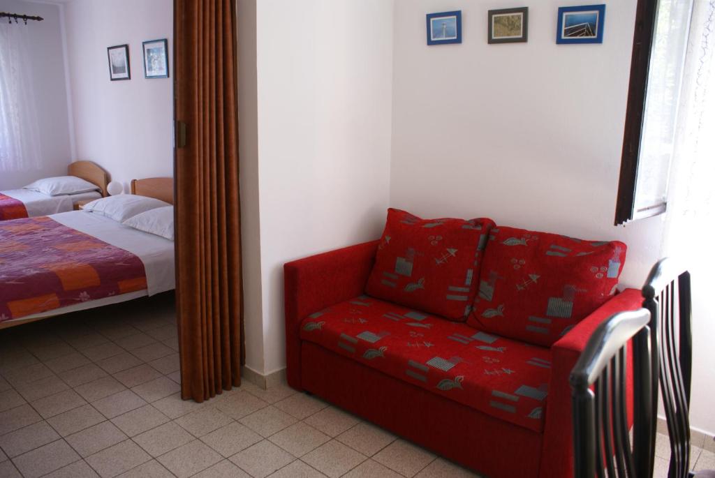Posteľ alebo postele v izbe v ubytovaní Apartment Ana M