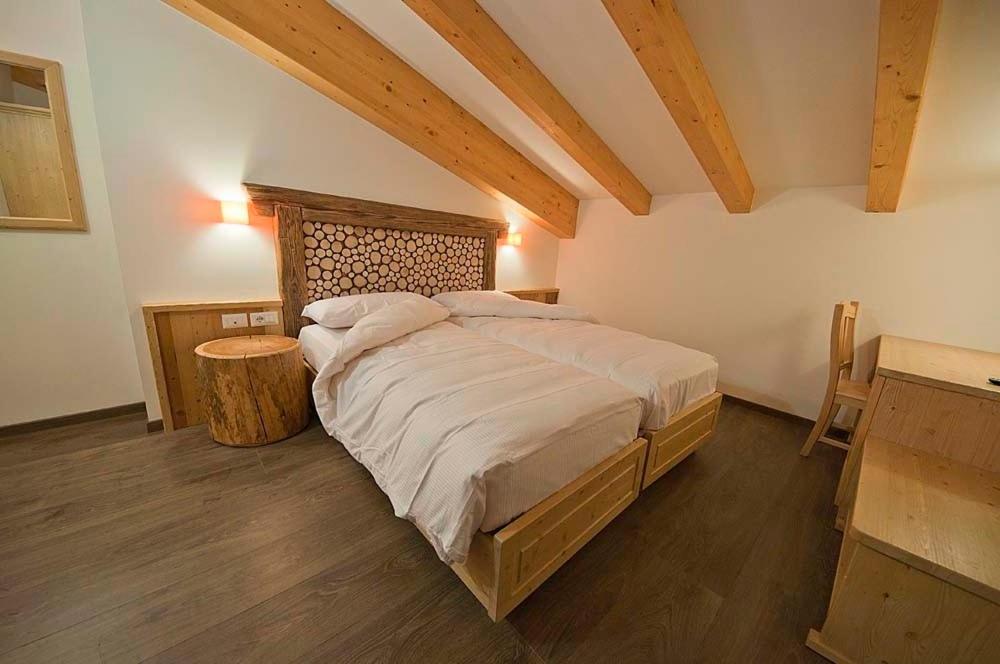 Postel nebo postele na pokoji v ubytování Hotel Niagara