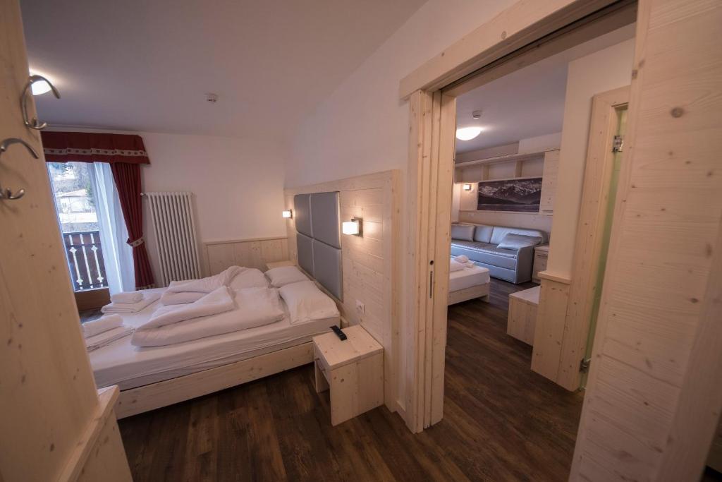 Postel nebo postele na pokoji v ubytování Hotel Niagara