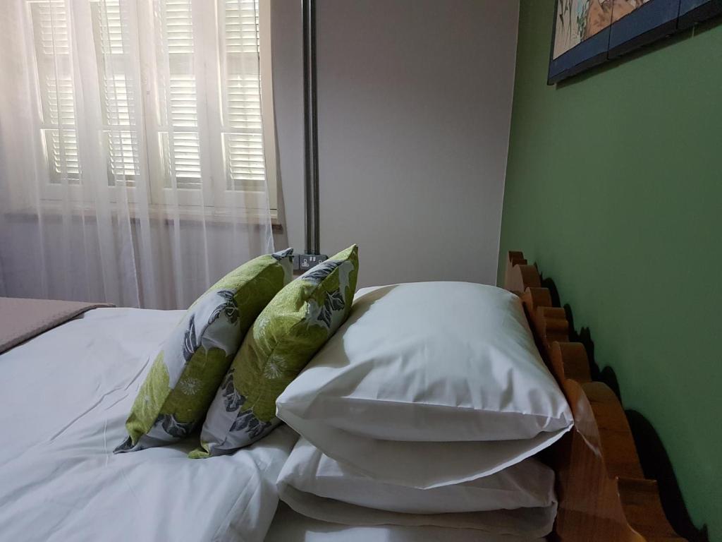 Postel nebo postele na pokoji v ubytování Ines Guest House