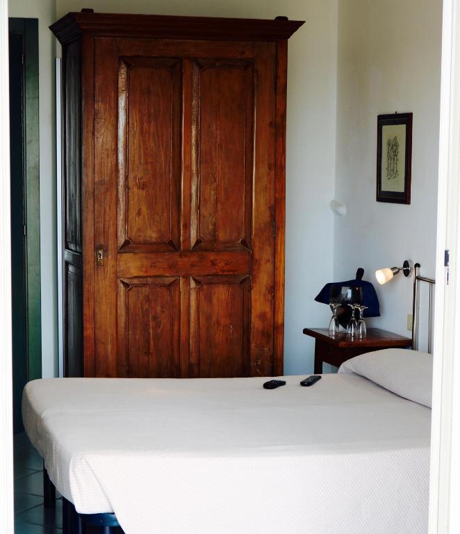 Postel nebo postele na pokoji v ubytování Hotel Rizieri