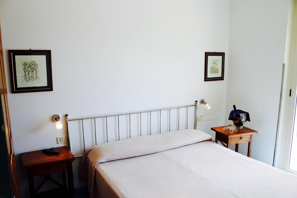 Postel nebo postele na pokoji v ubytování Hotel Rizieri