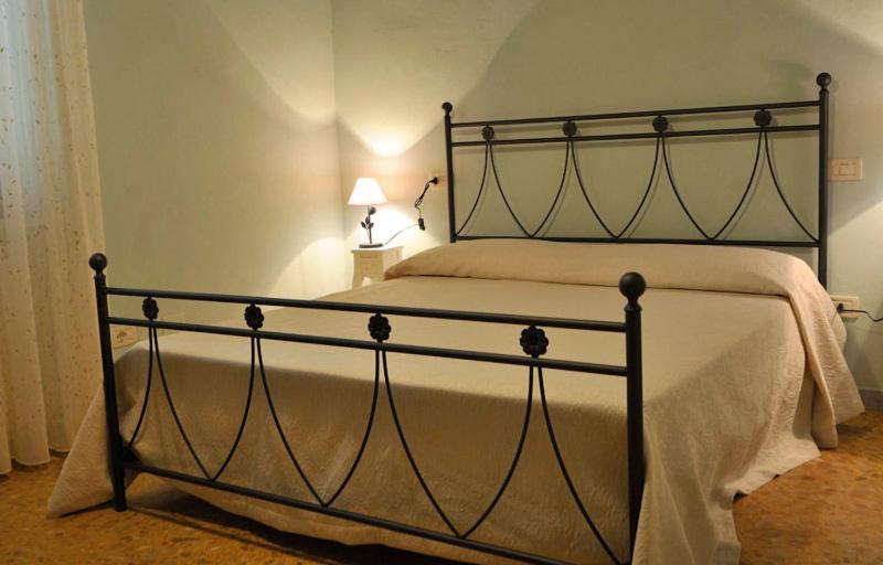 Postel nebo postele na pokoji v ubytování B & B Da Ferro
