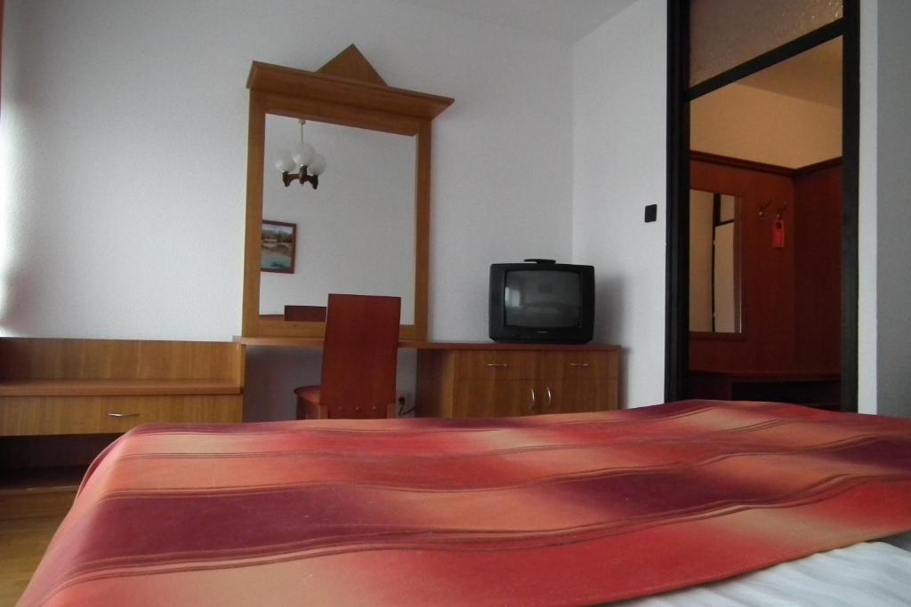 TV a/nebo společenská místnost v ubytování Hotel Napsugar
