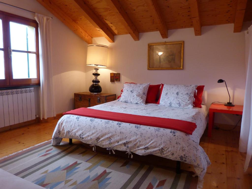 Postel nebo postele na pokoji v ubytování Olive Press Lodge