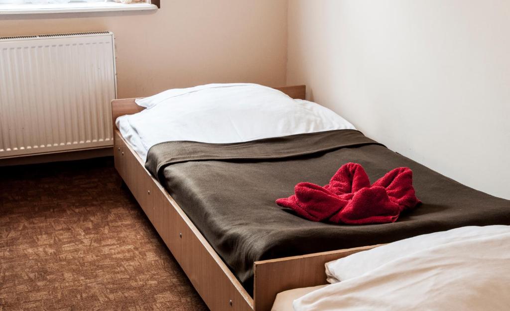 Postel nebo postele na pokoji v ubytování Gościniec Silver