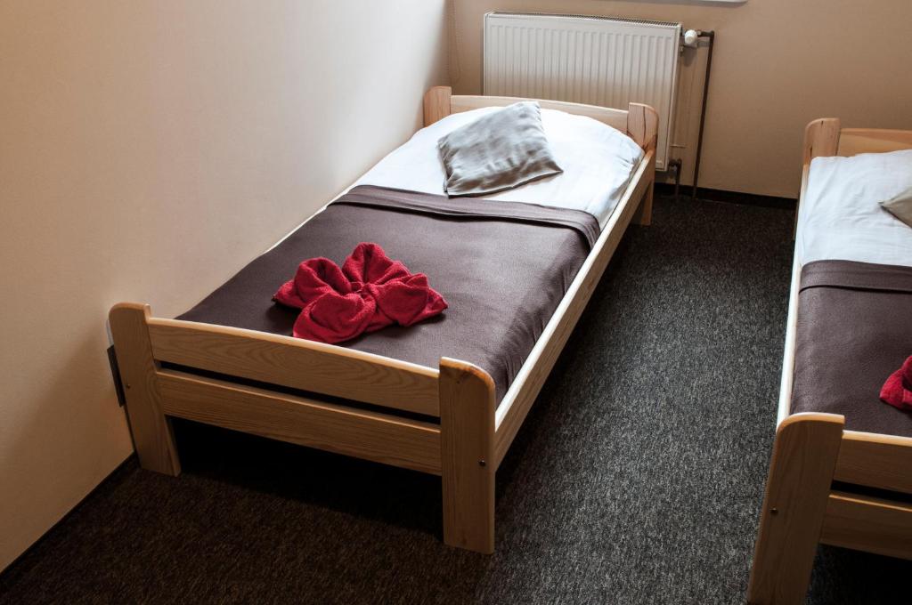 Postel nebo postele na pokoji v ubytování Gościniec Silver