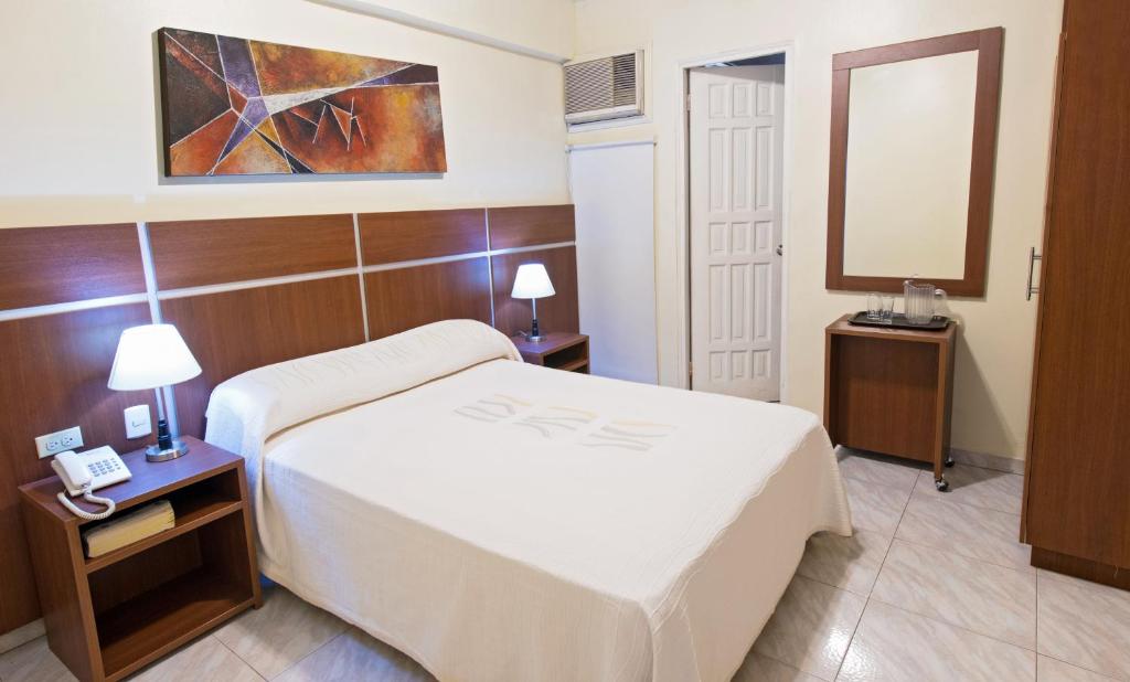 Postel nebo postele na pokoji v ubytování Hotel Benidorm Panama