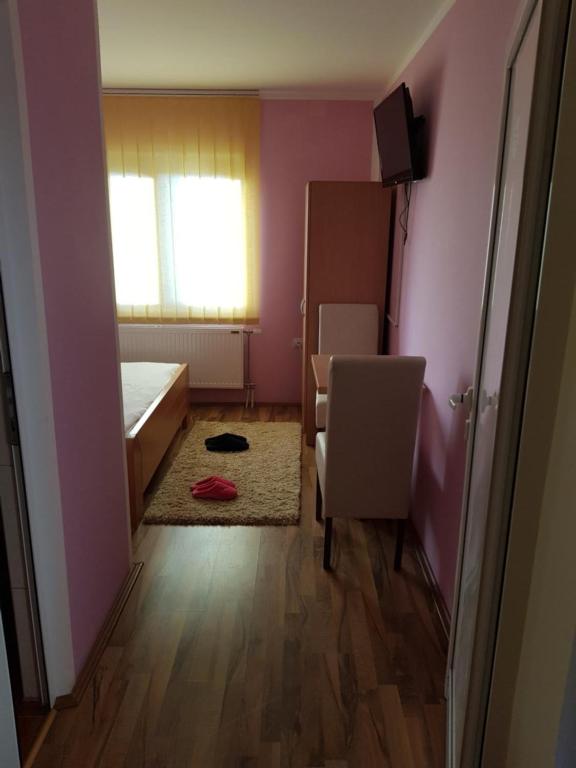 Postel nebo postele na pokoji v ubytování Guest House Lisinski Raj