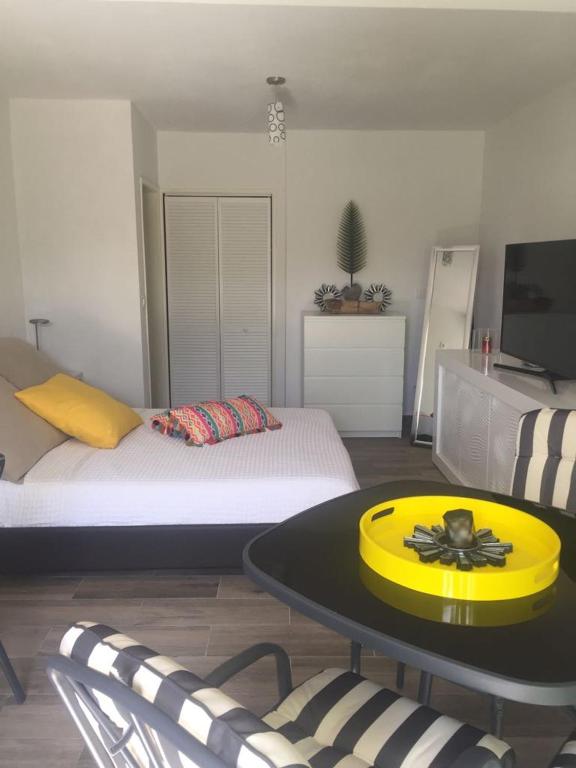 Postel nebo postele na pokoji v ubytování C'Renity Studio