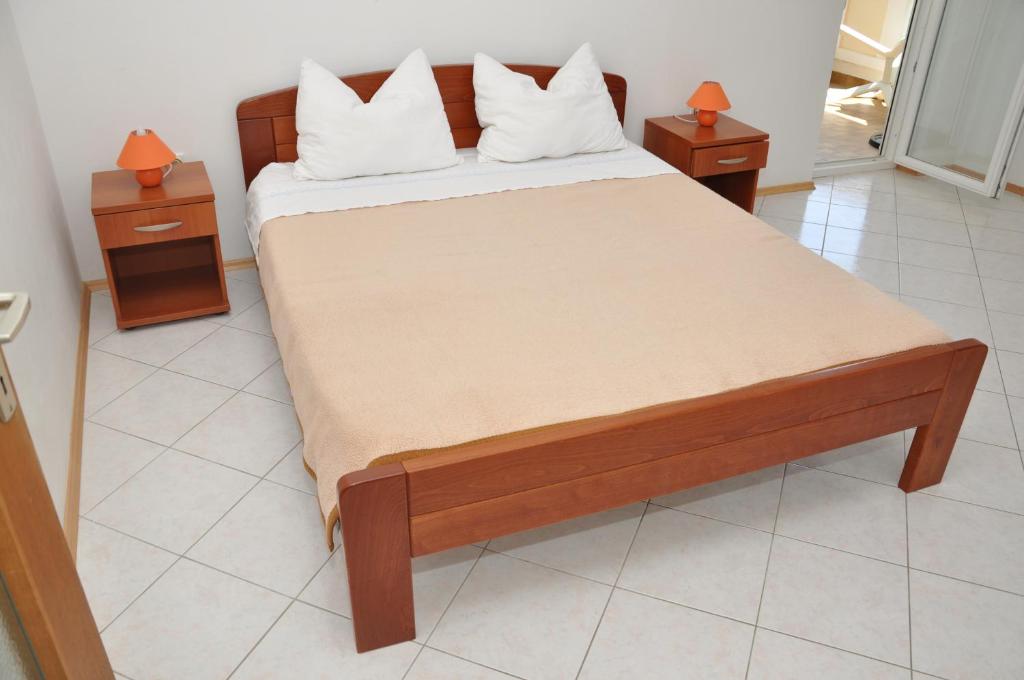 Posteľ alebo postele v izbe v ubytovaní Apartments Smilja