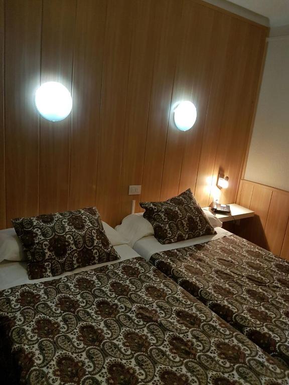 Postel nebo postele na pokoji v ubytování Hotel Comapedrosa