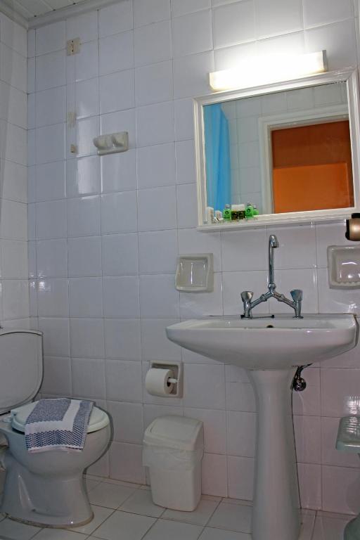 Koupelna v ubytování Castello Bianco Aparthotel