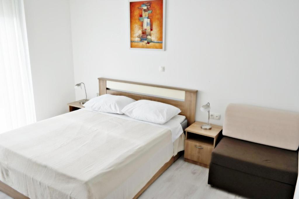 Postel nebo postele na pokoji v ubytování House Natali 70m from the beach - free EV top up
