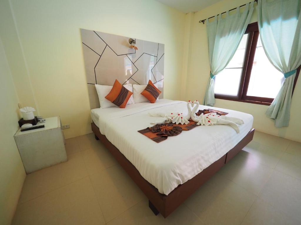 Postel nebo postele na pokoji v ubytování Lanta Fevrier Resort