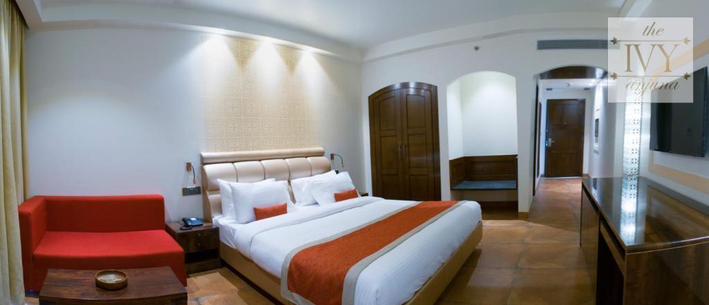 Кровать или кровати в номере The Ivy Anjuna