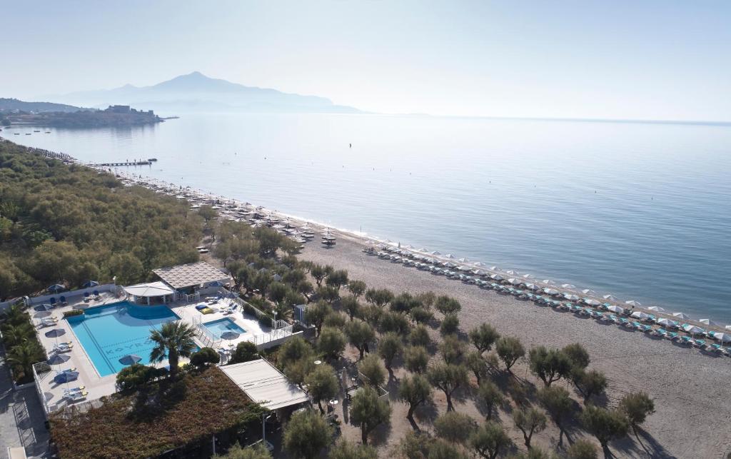 an aerial view of a beach with a resort at Kouros Seasight Hotel in Pythagoreio