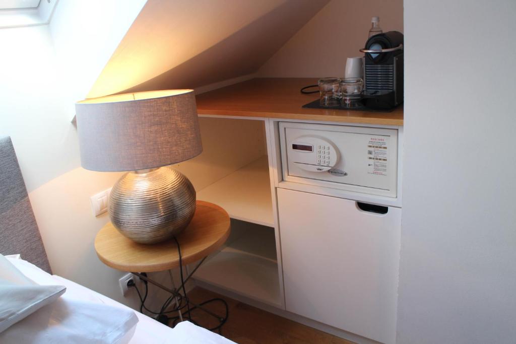 Kuchyň nebo kuchyňský kout v ubytování Jungmann Hotel