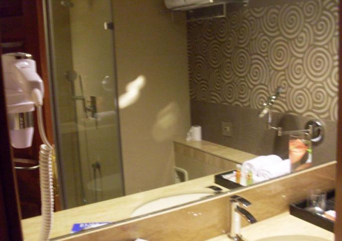 Koupelna v ubytování Hotel Sai Inn