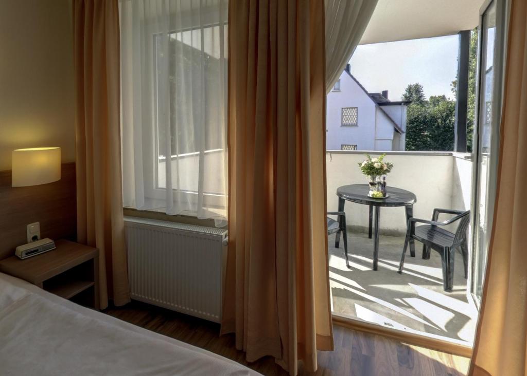 Postel nebo postele na pokoji v ubytování Hotel Marienthal Garni