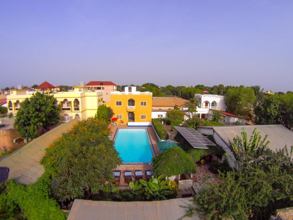 an aerial view of a house with a swimming pool at Sundowners in Manjai Kunda