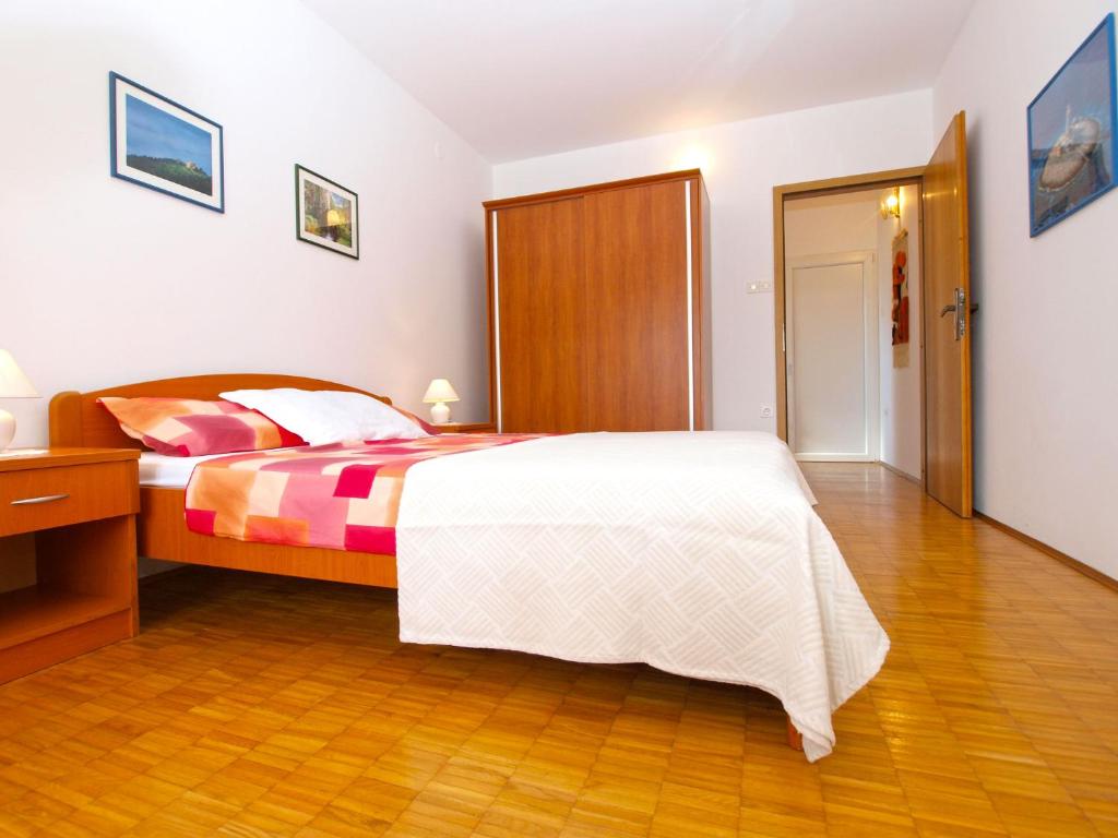 Łóżko lub łóżka w pokoju w obiekcie Apartment Nevenka 1482