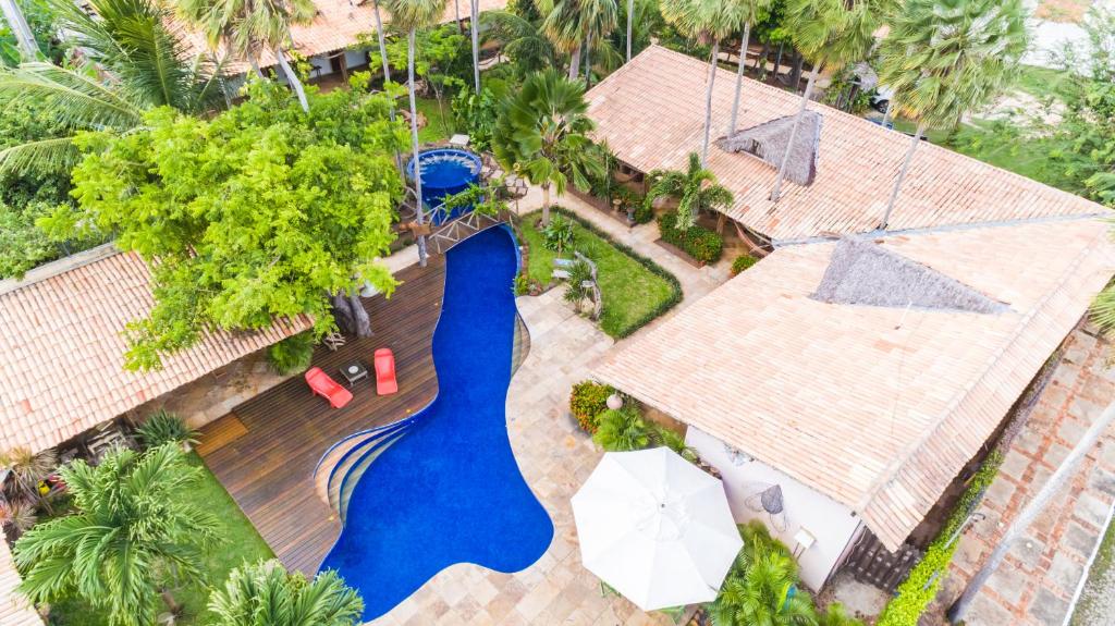 Der Swimmingpool an oder in der Nähe von Pousada Vila Parnaíba